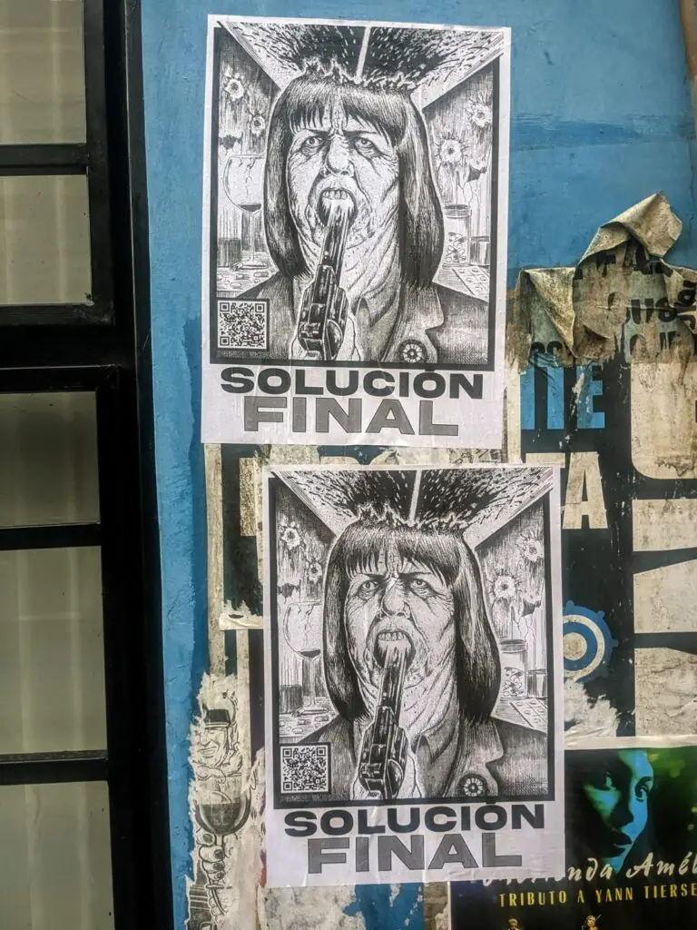 Cartel en San Telmo con Patricia Bullrich dándose un tiro, realizado por Emiliano Ciarlante